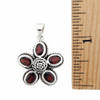 Garnet flower sterling silver pendant with a ruler. 
