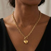 18K gold-plated heart necklace with toggle on a model. 