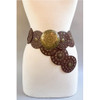 Gold disc western-style faux leather bet on a mannequin. 