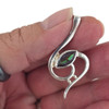 Mystic Topaz sterling silver pendant in my hand.  