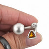 Amber and clear quality crystal adjustable ring with a ball in my hand. 