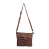 Brown leather Myra Bag Stratton Peak crossbody purse. 
