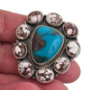 Wild Horse and Turquoise sterling silver statement ring in my hand. 