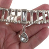 Silver-plated clear crystal teardrop choker necklace in my hand. 