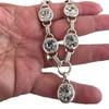 Round Swarovski clear crystal silver-plated necklace in my hand.