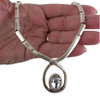 Gray tone crystal necklace with lobster claw in my hand. 