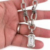 Clear crystal dangle necklace in my hand. 