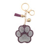 Pink paw keychain with rhinestones. 