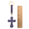 Purple rhinestone cross keychain with a ruler. 