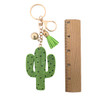 Green cactus rhinestone keychain with a ruler. 