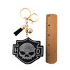 Skull rhinestone keychain with a ruler. 