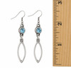 Blue crystal long open marquise dangle earrings with a ruler. 