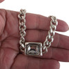 Clear rectangle crystal chain necklace in my hand.