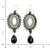 Black beaded large dangle earrings with a ruler. 