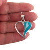 Open heart Turquoise and Opal sterling silver pendant in my hand. 