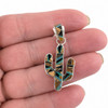 Brown multi-stone sterling silver cactus pendant in my hand. 