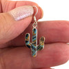 Sterling Silver Tiger’s Eye Onyx Opal Inlay Cactus Earrings in my hand