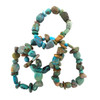 Four chunky turquoise nugget stretch bracelets arranged together, showcasing unique stone shapes, blue and green colors, and distinctive Southwestern style.
