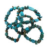 Assorted turquoise nugget elastic stretch bracelets arranged together, featuring polished blue and green stones with distinctive earthy matrix patterns.