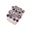 Close-Up of Sterling Silver Multi-Stone Amethyst Ring Featuring a Bold Cluster Design with Round and Oval Purple Gemstones in Polished Silver Bezel Settings.
