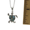 Sterling silver sea turtle with Larimar stones.