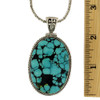 Large Turquoise pendant with ruler.