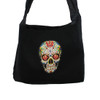 Close up view of Day of the Dead skull bag. 