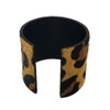 Backside of tan leopard print cowhide cuff bracelet.