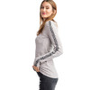 Side view of women's rib knit long sleeve shirt with leopard print tape detailing on sleeves. 