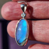 In the sun with the blue flash on Labradorite sterling silver pendant. 