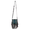 Full picture of genuine leather Montana West turquoise tooled fringe purse. 