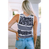 Backside of gray leopard print and white tank top. 