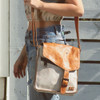 BED|STU Genuine Leather VENICE BEACH Nectar Lux Tan Rustic Purse front view on model. 