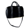 Faux fur handbag with shoulder strap.