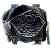 Faux fur handbag with shoulder strap.