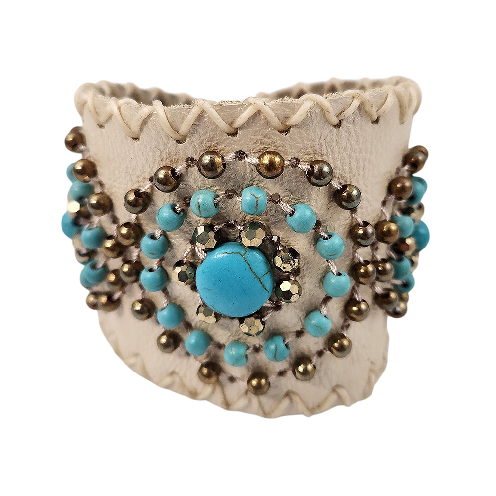 Beige leather beaded cuff bracelet with turquoise accents. 