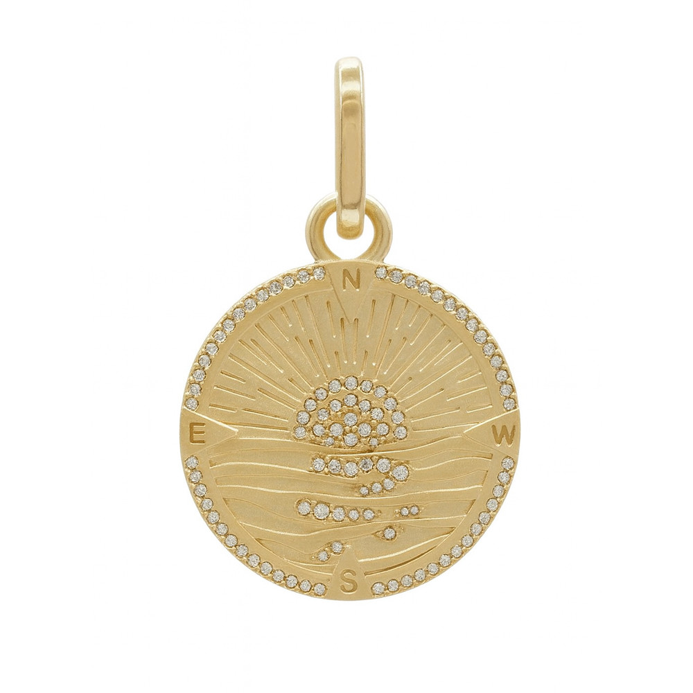 Sunrise compass gold-plate pendant with CZ stones.