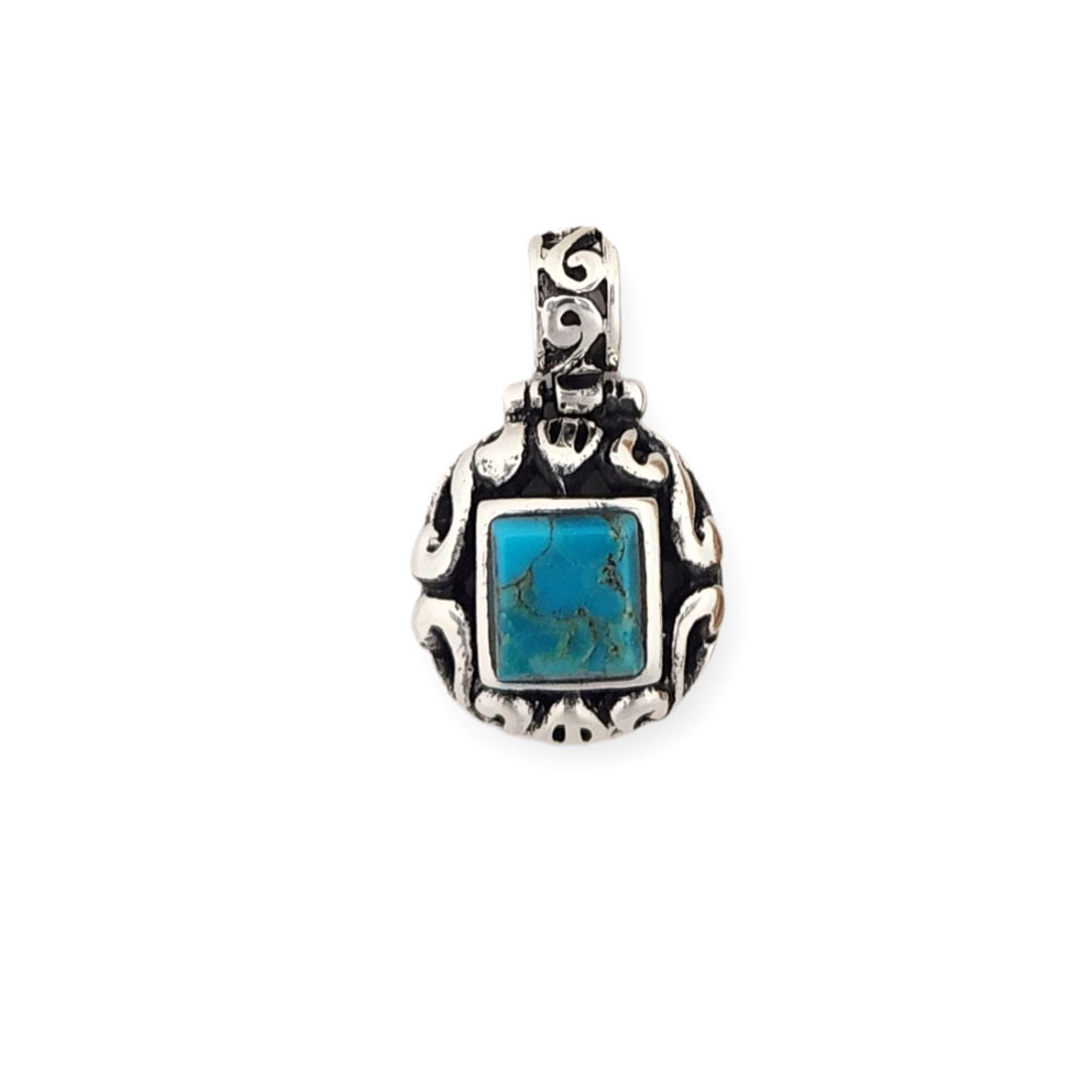 Bali-style turquoise stone sterling silver pendant.  Bali-style turquoise stone sterling silver pendant.