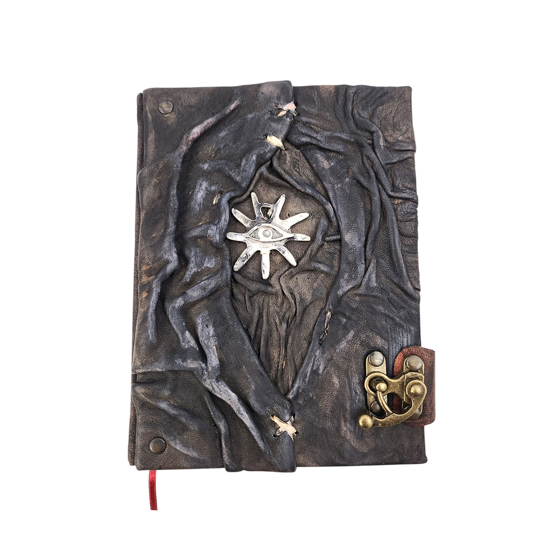 Handmade rustic leather journal with sun and evil eye design. 