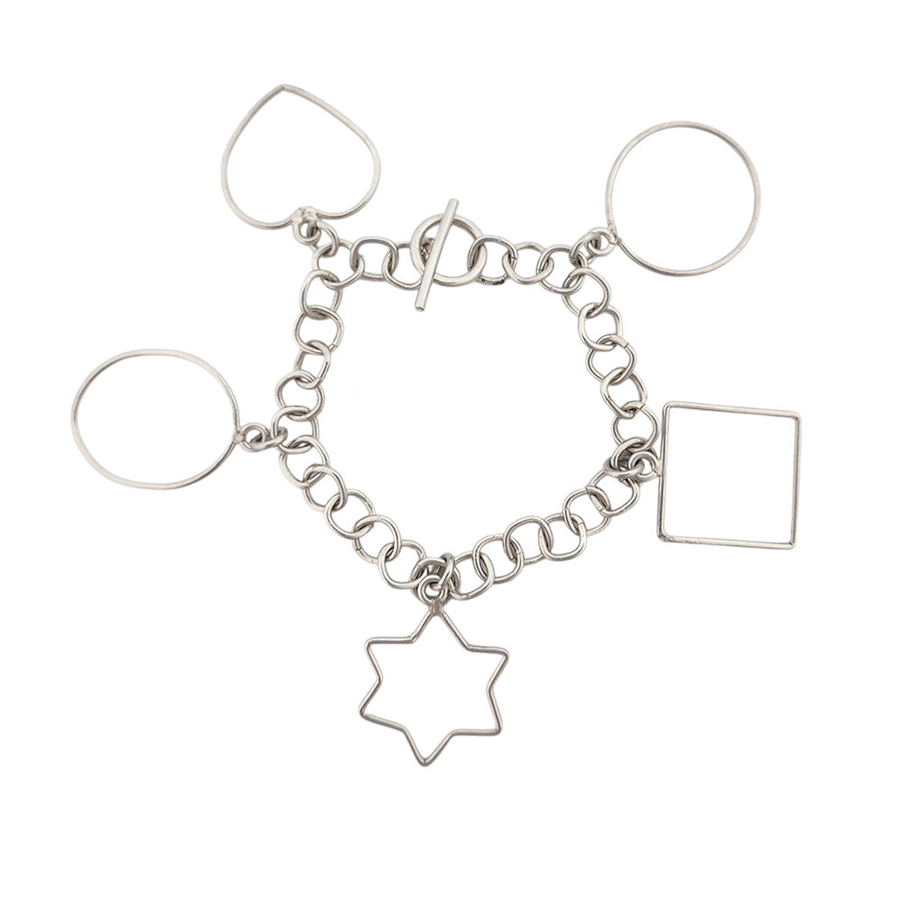 Sterling silver geometric shapes charm bracelet. 