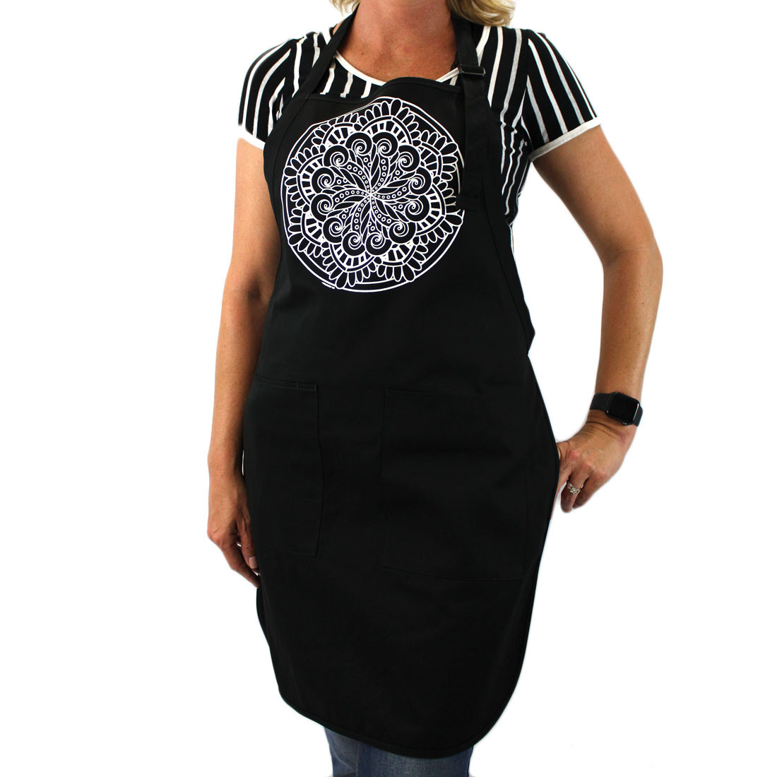 White Mandala on the front of a black cotton apron. 