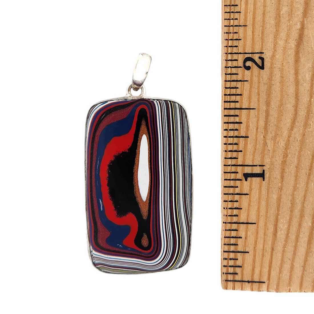 Size of large red, white and black Fordite silver pendant. 