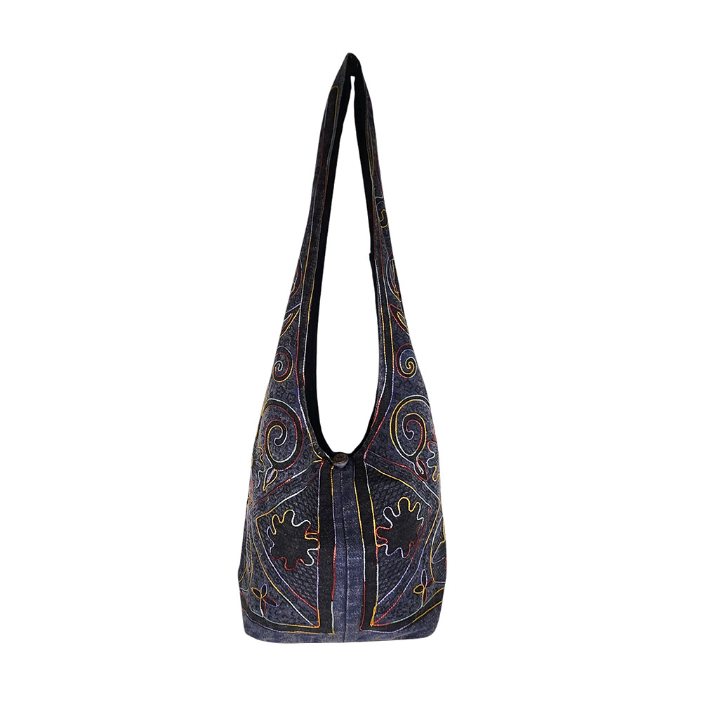 Front of blue boho sling bag. 