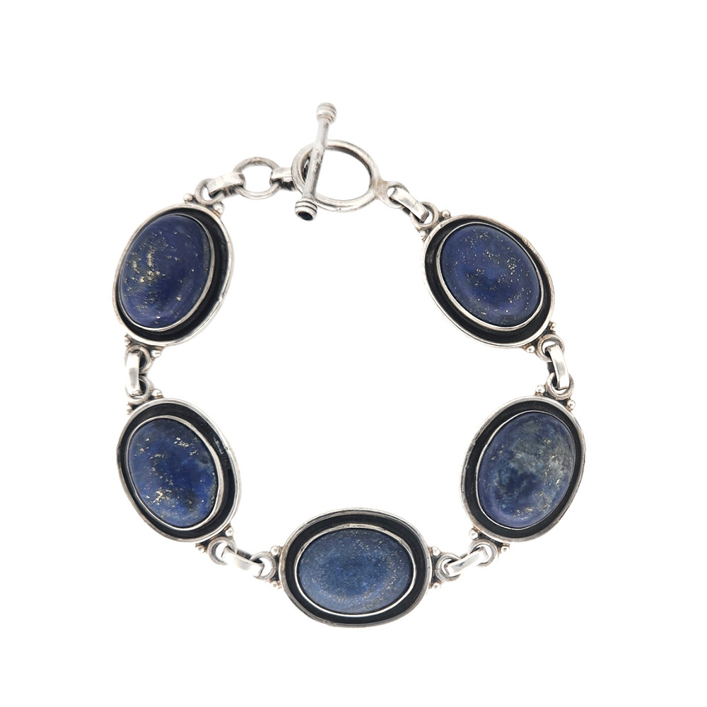 Blue Lapis sterling silver bracelet with a toggle clasp. 
