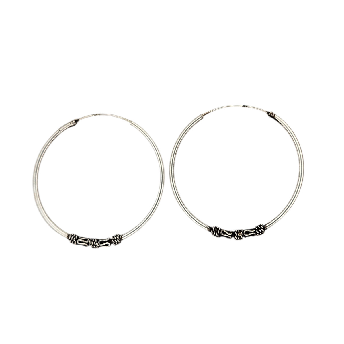 Bali style hinged sterling silver hoops. 
