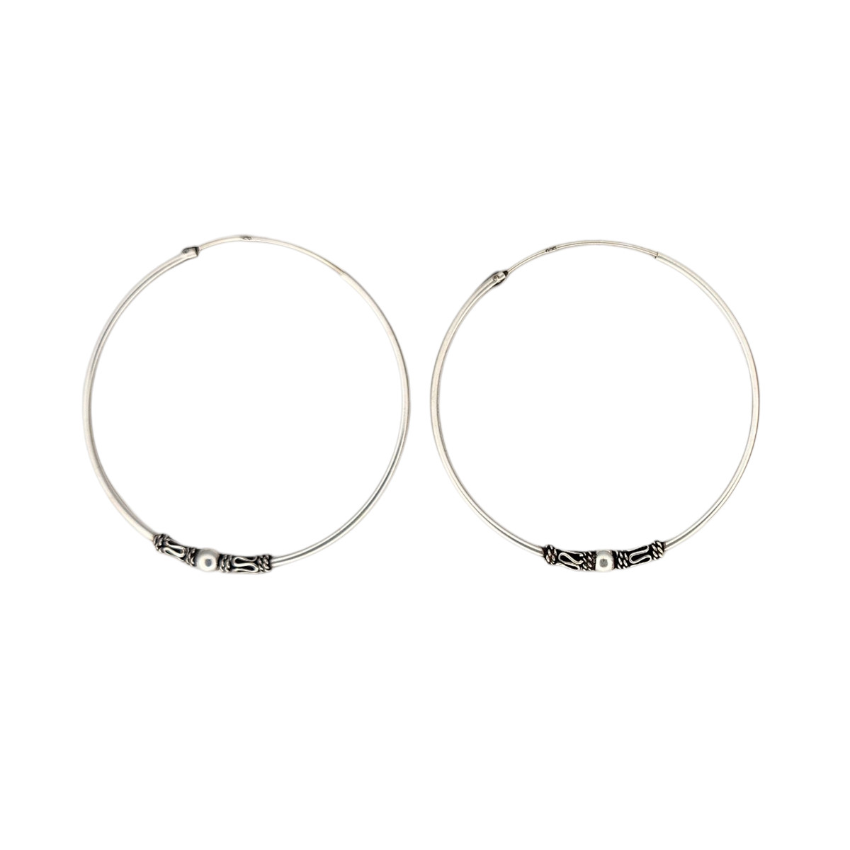 50mm Bali-style sterling silver hoops.