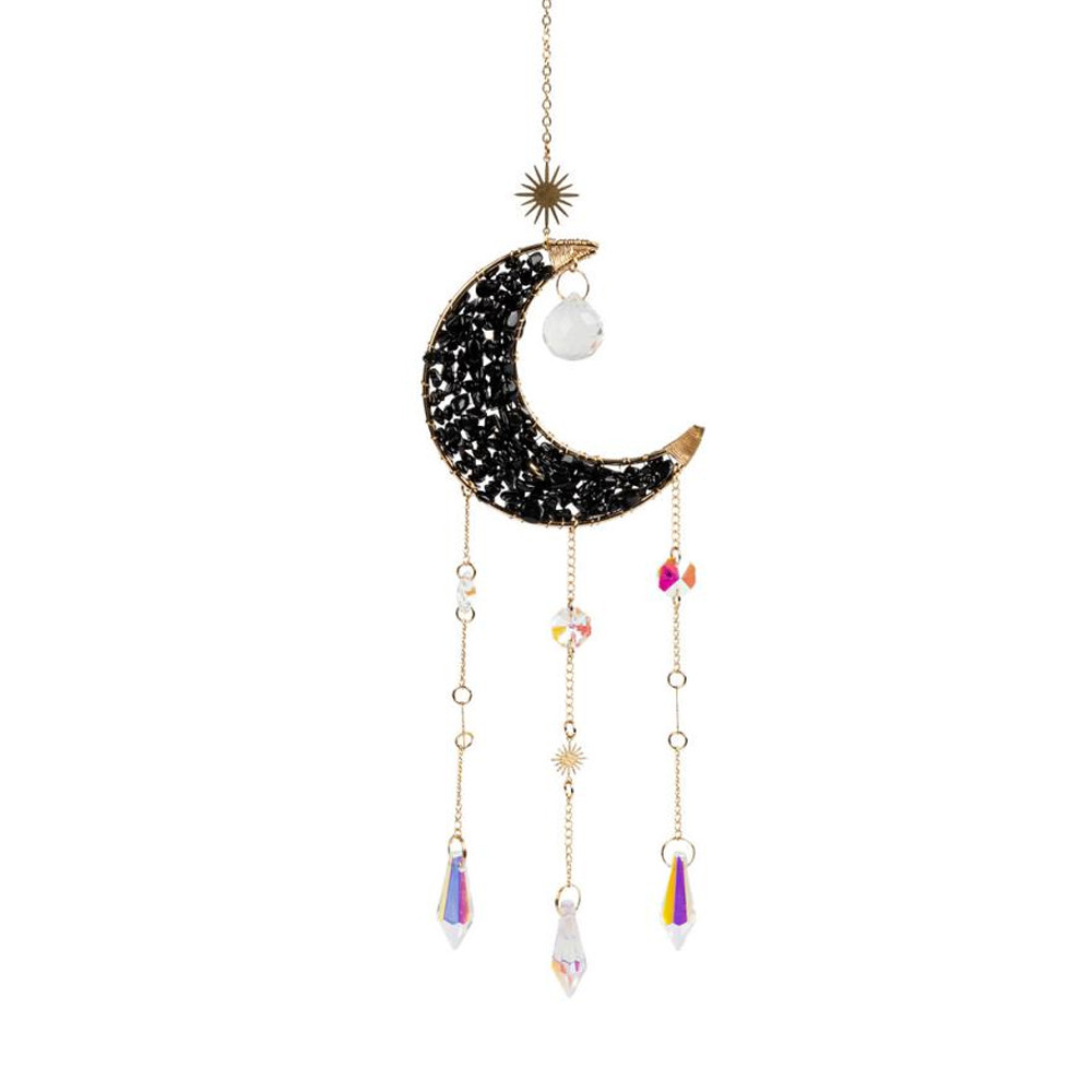 Black Obsidian Crescent Moon Suncatcher featuring a gold-tone crescent moon embellished with black obsidian stones, decorative sunburst accents, a suspended translucent bead, and three dangling chains with colorful iridescent crystal prisms. This 21-inch celestial hanging decoration adds a beautiful bohemian touch to windows and home decor.