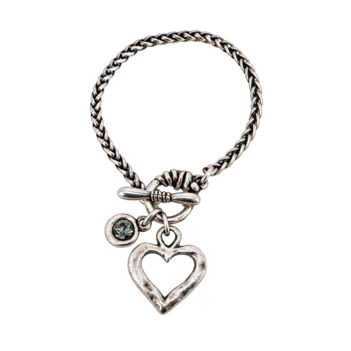 Silver-plated braided chain toggle bracelet with textured open heart charm, faceted gray crystal stone, and Pacific Northwest charm on a white background.