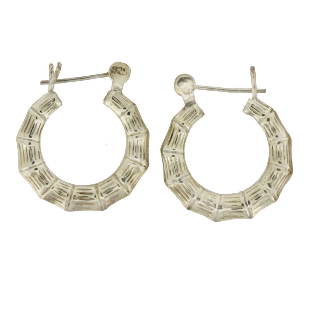 Textured sterling silver hoops.