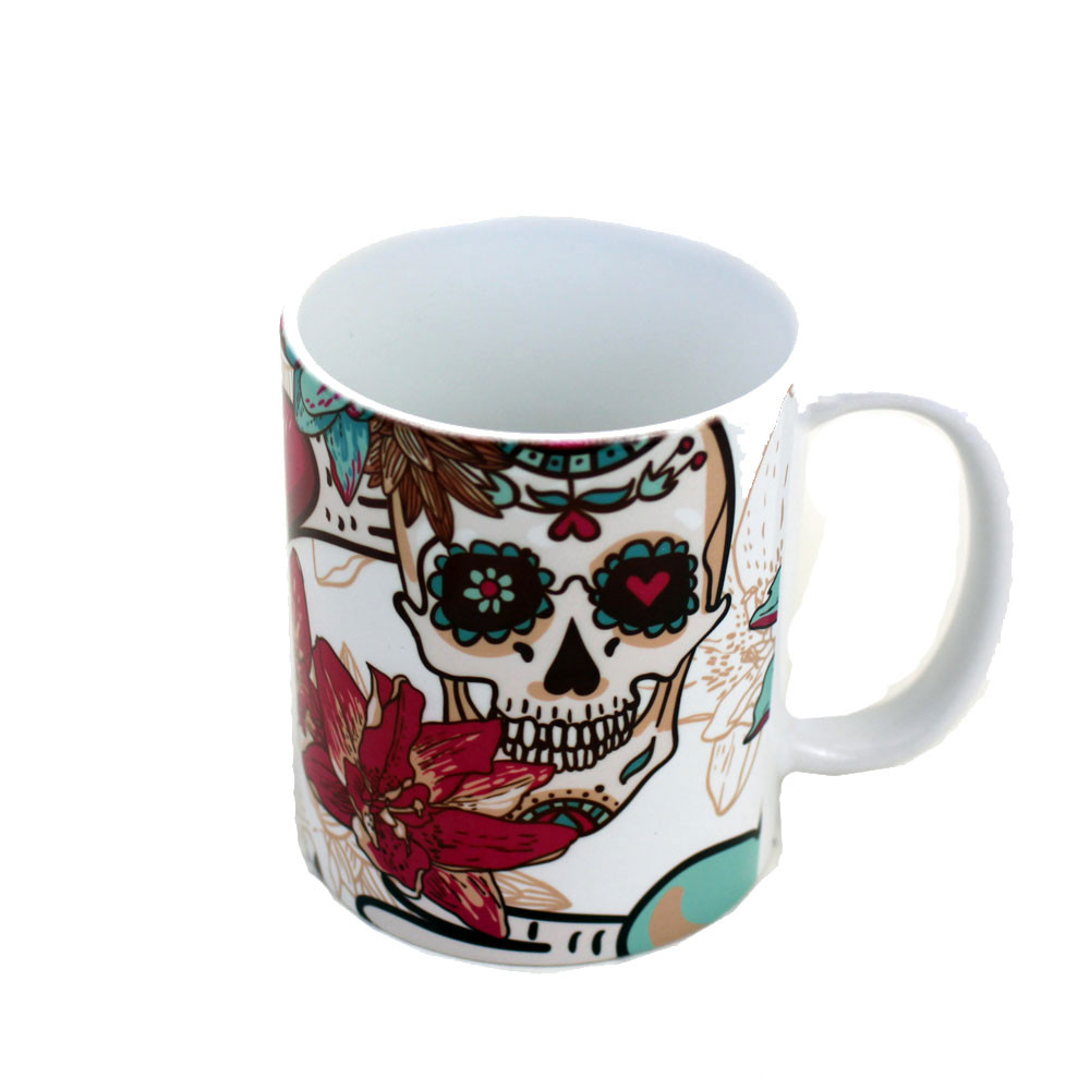 11 oz. Coffee mug with sugar skulls, hearts and flowers.